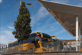 Yellow bus at depot